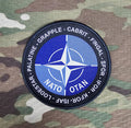 NATO North Atlantic Treaty Organisation / isaf / otan / kfor / ifor / Cabrit - British Military Army Navy RAF woven 80mm dia patch / badge